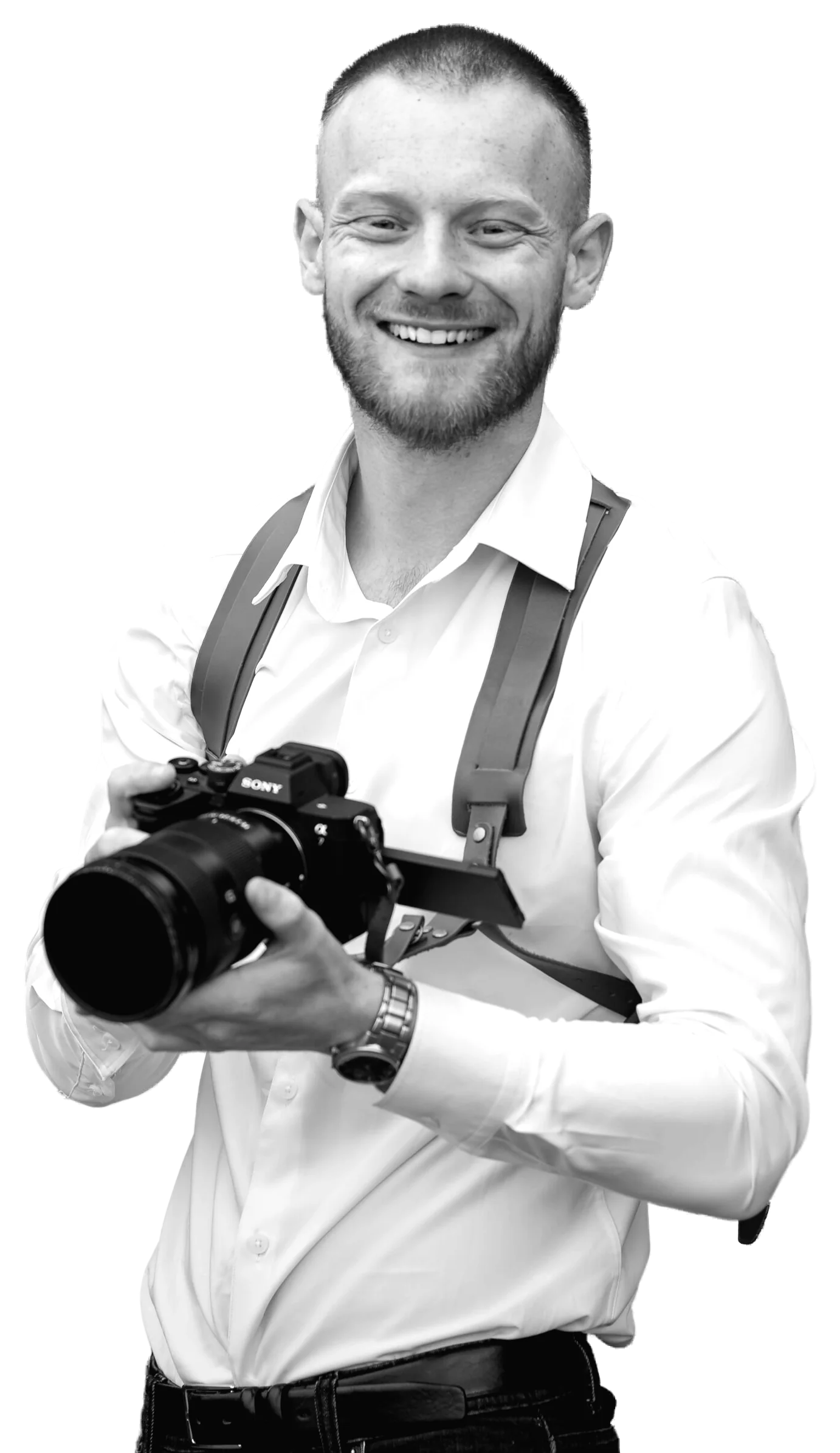 Johnny Blades holding a camera.